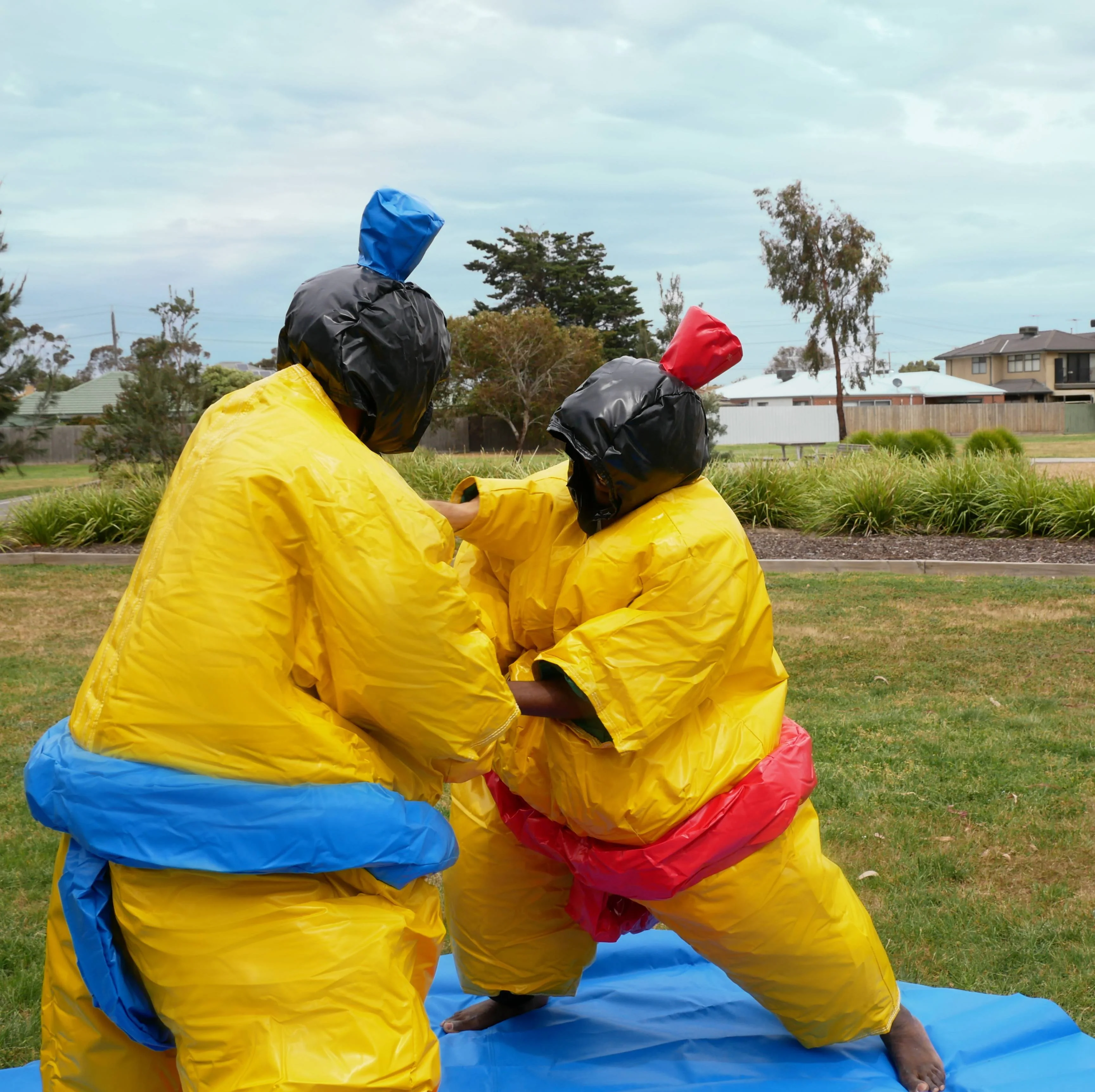 Two PVC and Fabric Adult Sumo Suits with Helmets Gloves and 291cm Mat - Image 3