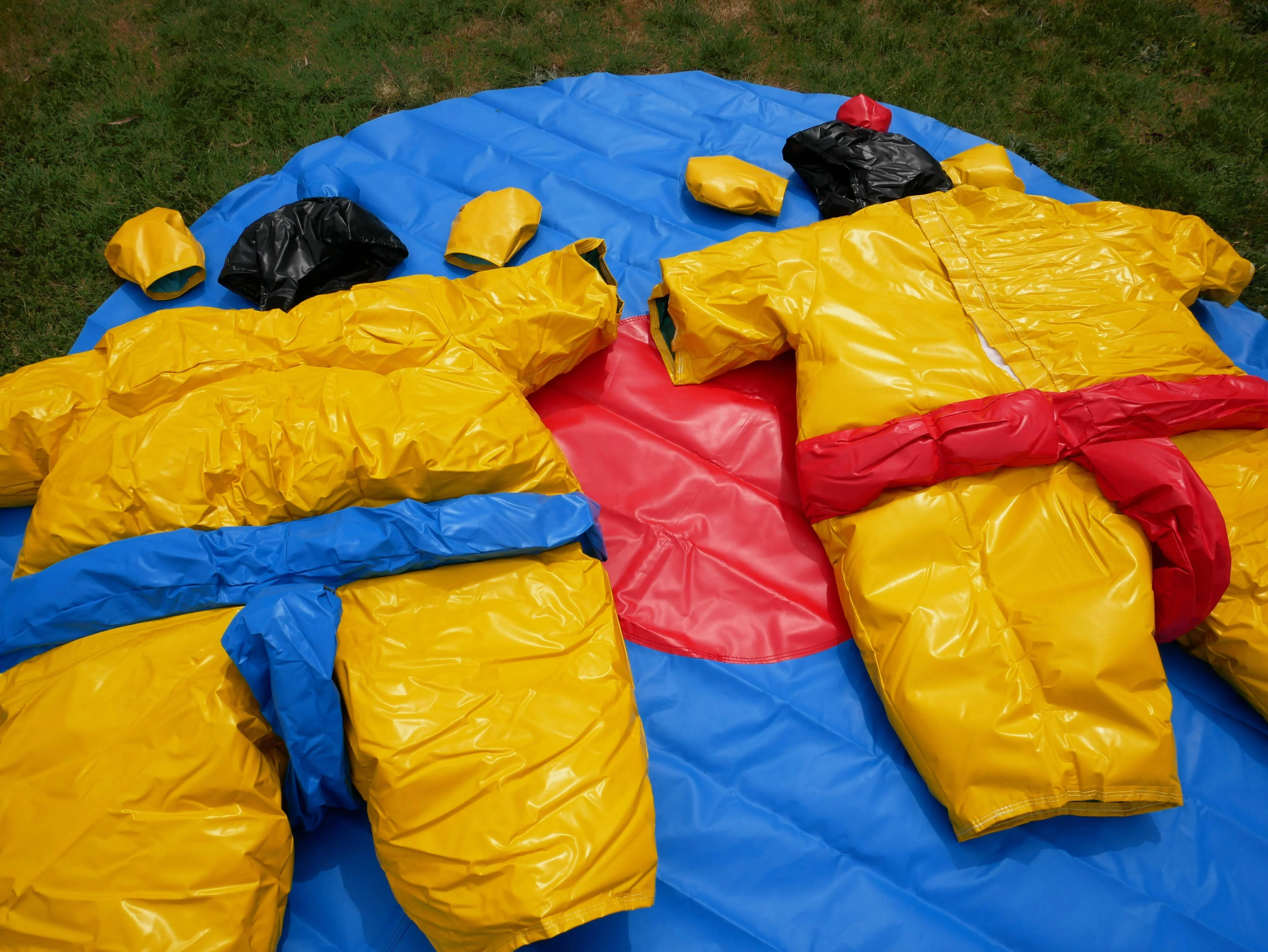 Two PVC and Fabric Adult Sumo Suits with Helmets Gloves and 291cm Mat - Image 4